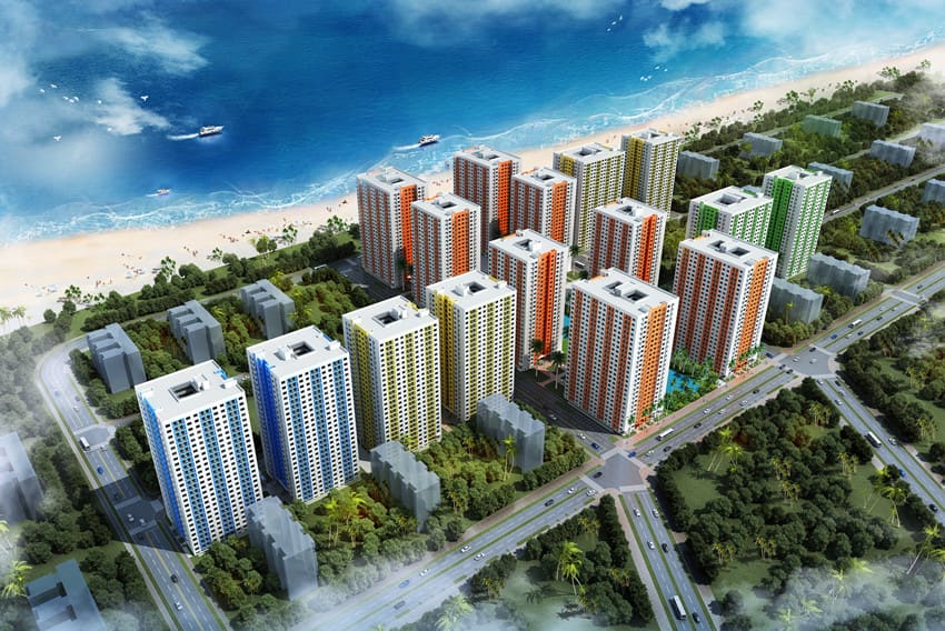 Rendering of a coastal housing development with apartment blocks beside the sea.